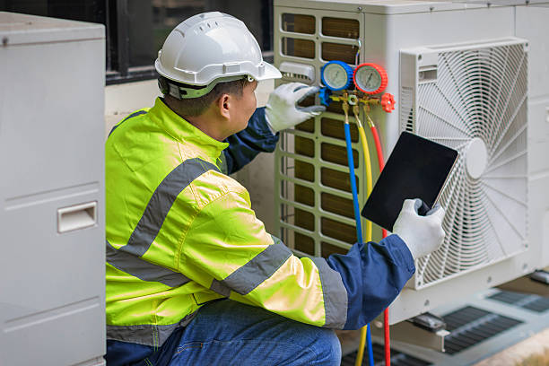 Professional Heat Pump Repair technician working in Mahopac Falls, NY